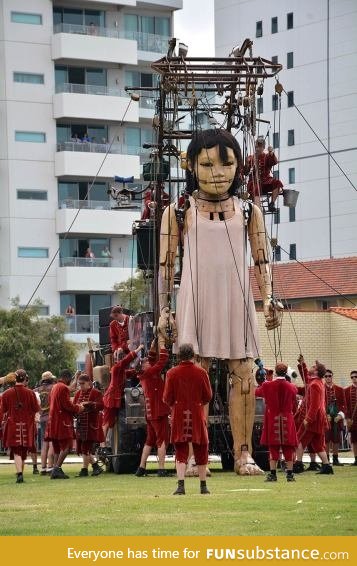 Giant little-girl marionette