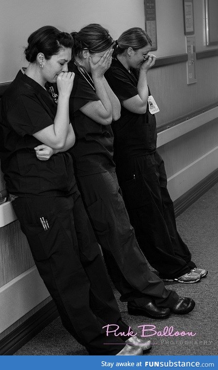 Nurses after a patient suffers a miscarriage