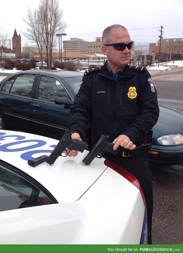 Police Officer compares his firearm to a bb gun recovered during a school fight