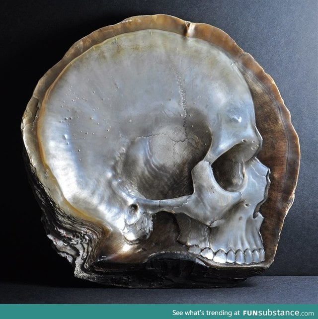 A skull carved from mother of pearl by Gregory Halili