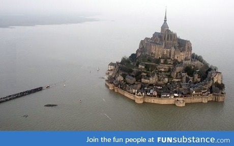 A supertide has turned France's famed Mont Saint-Michel into an island.