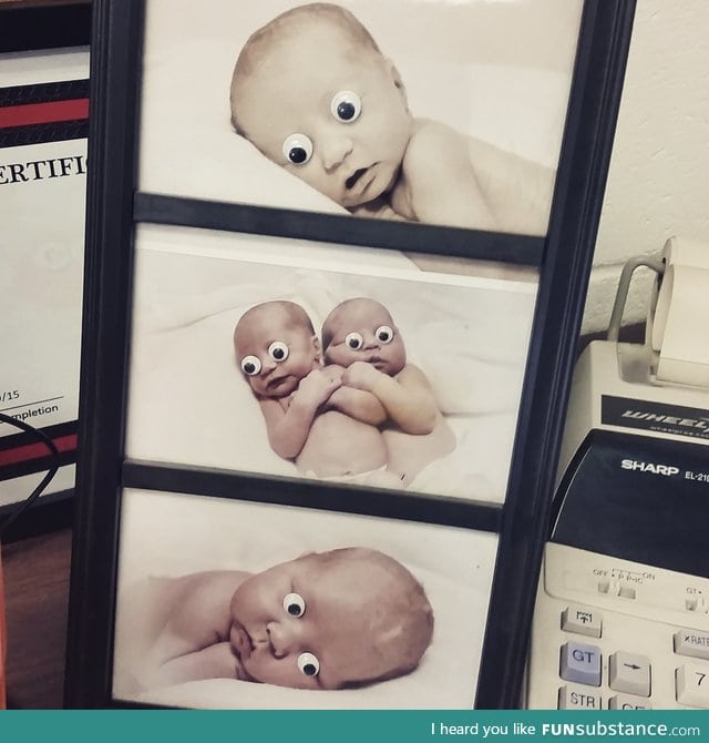 I took my googly eyes to work and decorated my coworker's photos on his desk