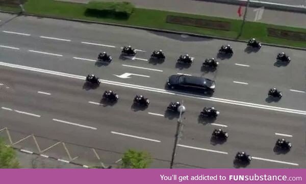 Australian police escorting Putin