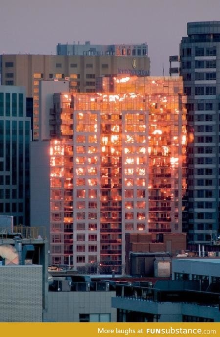 Every time I think that this building is burning, but it is a reflection of the sunset