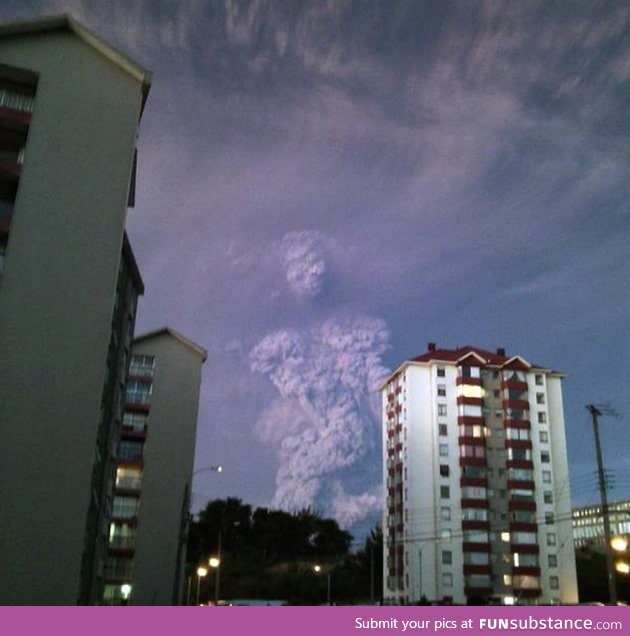 Human-shaped cloud emerging from ash of chilean volcano