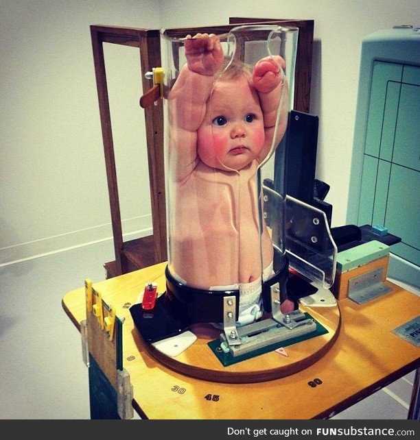 A baby getting an X-Ray looks hilarious