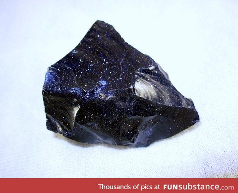 A rock that looks like a piece of space