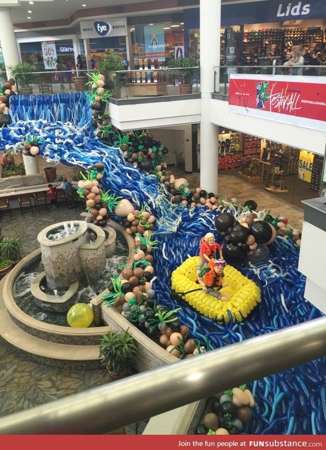 Waterfall and rafting scene made entirely from balloons