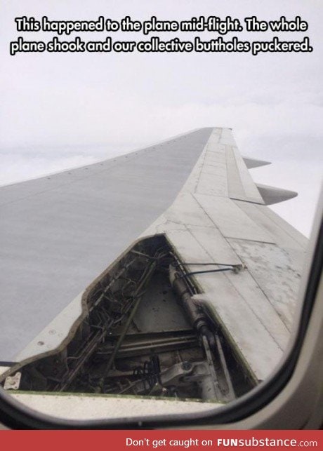 A hole in the plane's wing mid flight