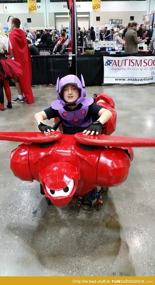 There was a kid riding a Baymax at KC Comic Con!
