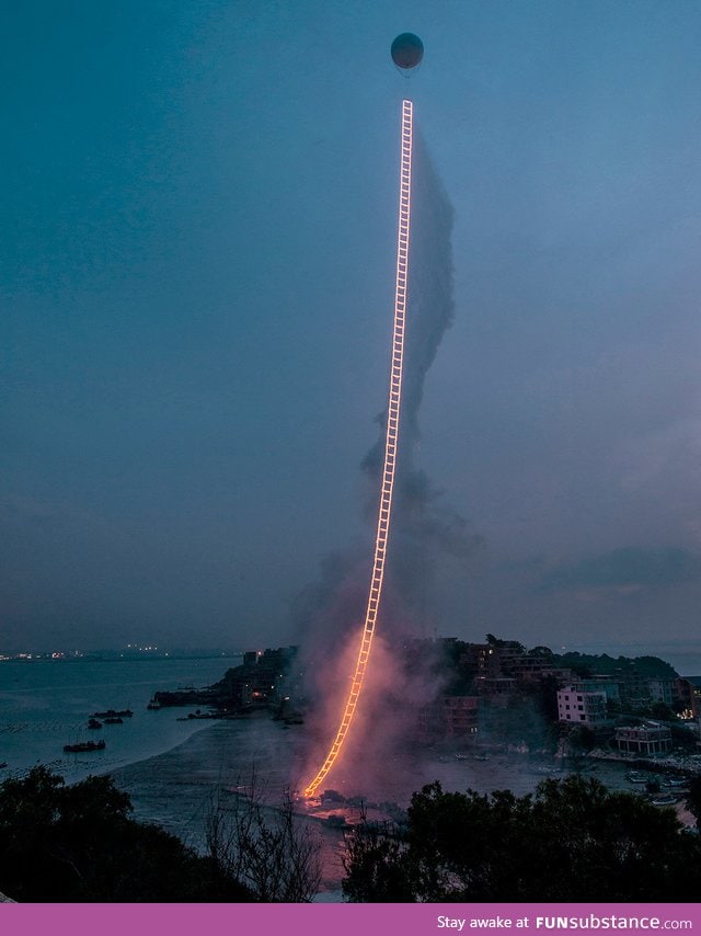 Artist creates a 500-meter ladder of fire in the sky