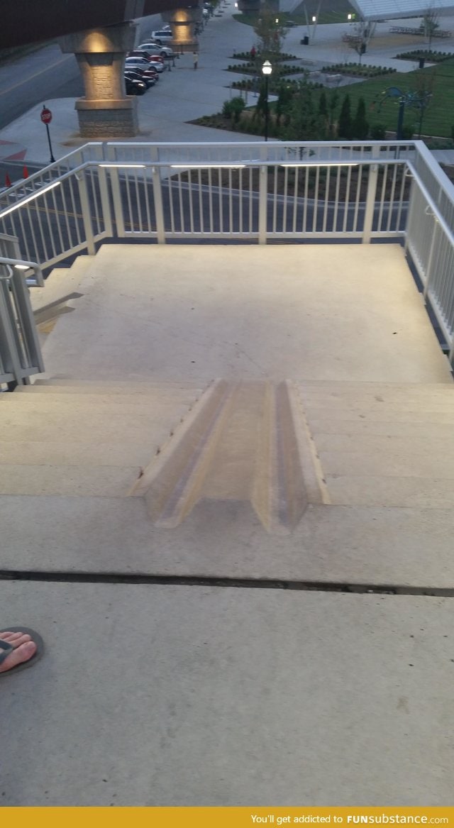 These stairs have slots to make it easy for you to bring your bike up and down them