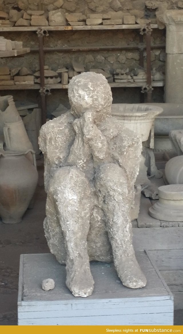 Man trying to cover his face, Pompeii