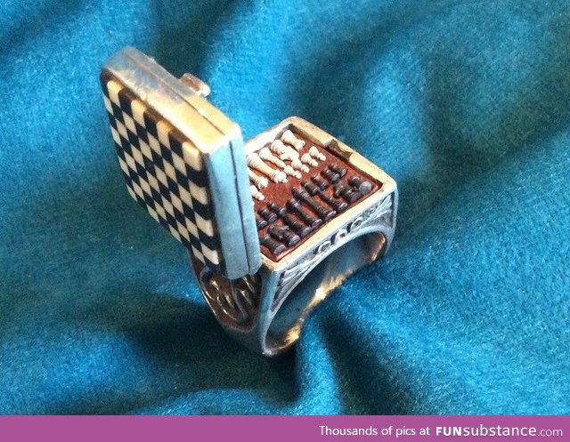 The world's smallest chess set in a ring