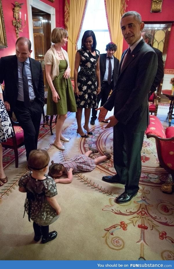 Kid throws a fit next to Obama