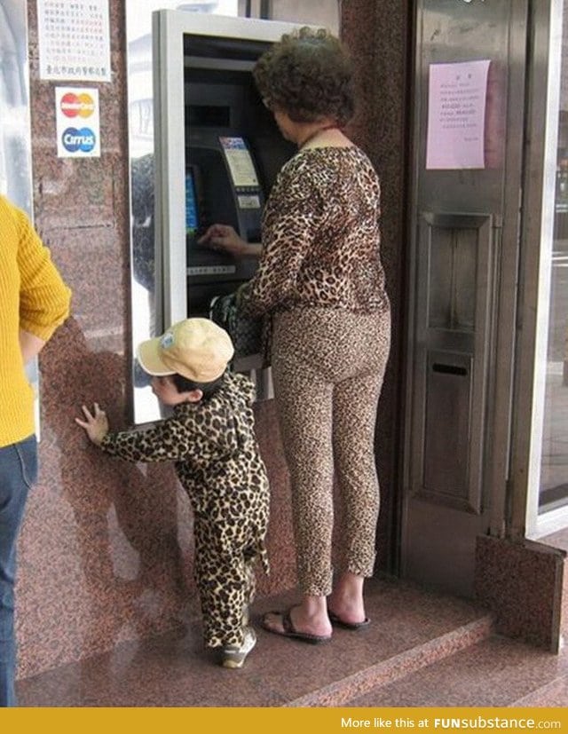 The rare "Urban Leopard" and her cub photographed in their natural habitat