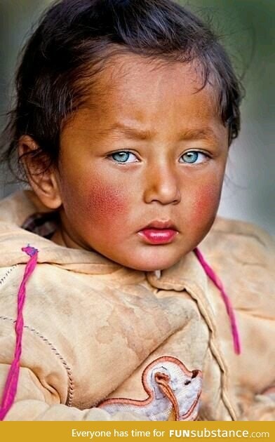 beautiful blue eyed boy from nepal