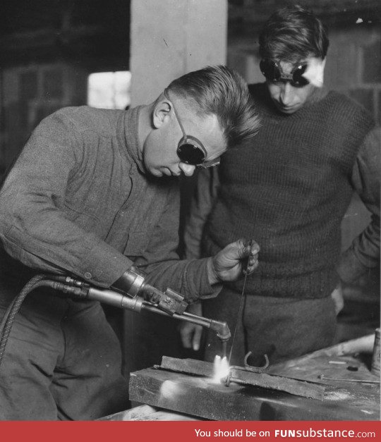 World War I amputee fitted with a welding arm, 1920