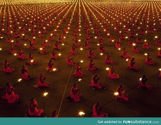 Countless monks in prayer for a better world