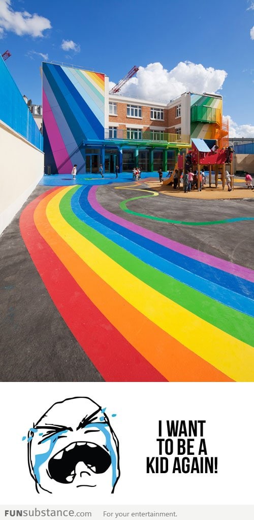 A Kindergarten Building Covered In Rainbows