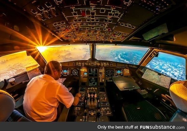 'Sunrise in the Office', 35,000 feet above the Indian Ocean