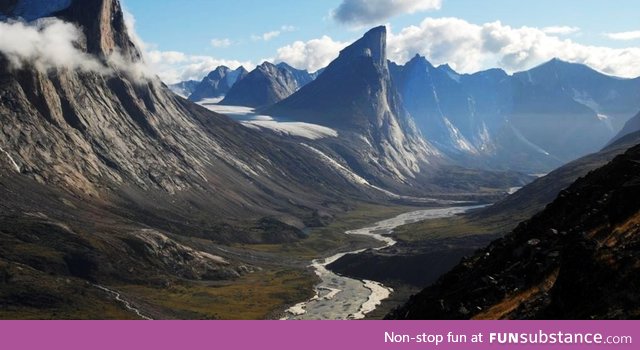 Mount Thor in Canada, Earth's greatest vertical drop of 1,250 m (4,101 ft)