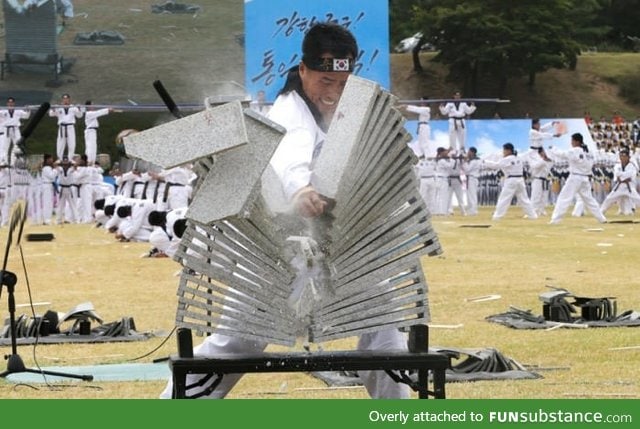 Korean soldier breaks 23 stone slabs in one hit