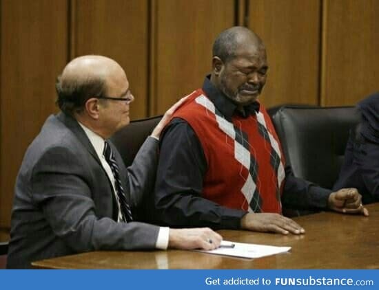 Picture of a man being told he was innocent, after 40 years spent in prison