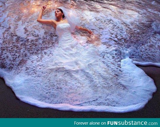 Wedding dress in the waves