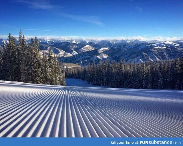 A freshly groomed ski slope