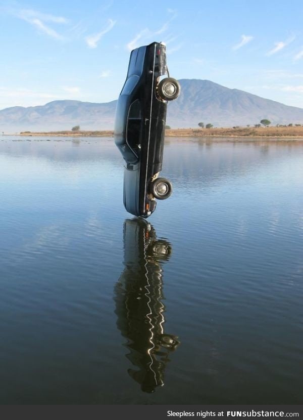 A car the moment before it hits the water