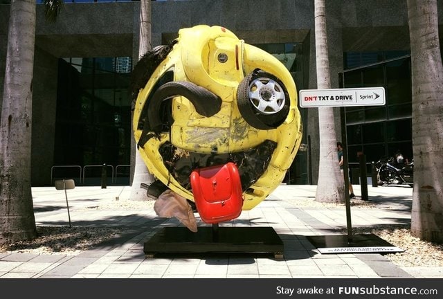 Rudolf Kohn, transformed a mangled car into an emoji as an anti texting while driving