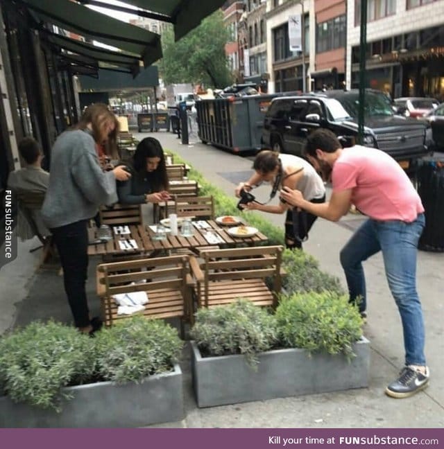 A group of hipsters eating their lunch