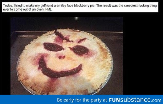 Smiley face blackberry pie