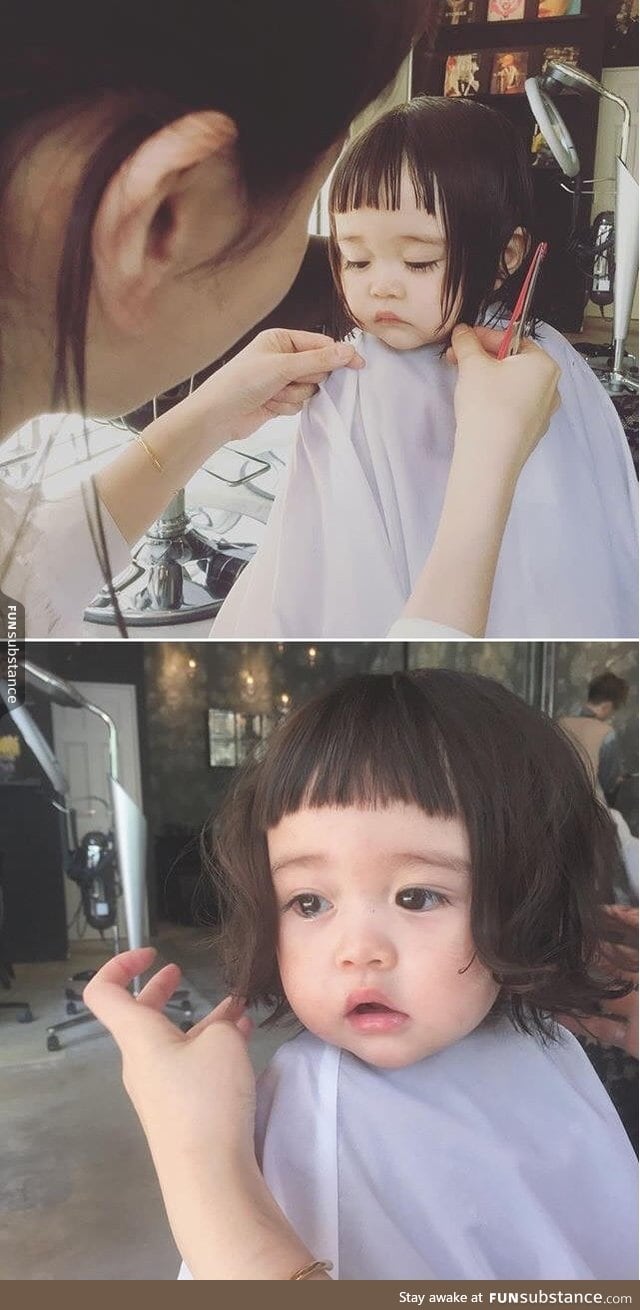 Little girl getting her first haircut