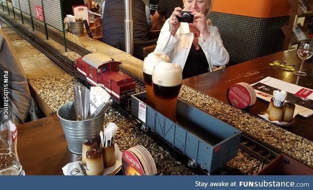 Beer at a restaurant in Prague is delivered by a miniature train