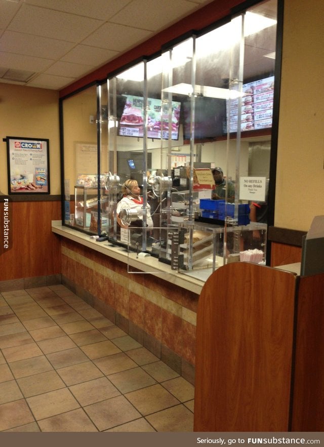 You know you're in the bad part of town when the Burger King has bulletproof glass