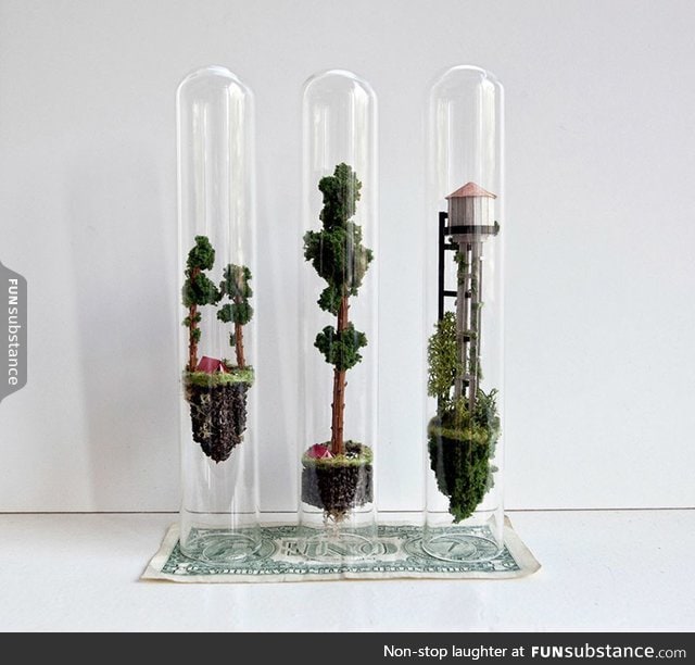 Tiny floating worlds inside glass test tubes