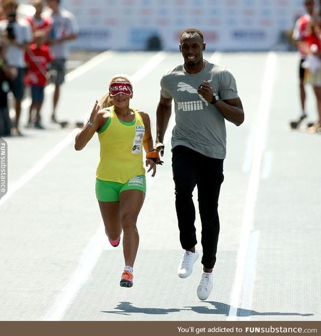 Usain Bolt runs as guide for Brazil's three-time blind Paralympic sprinting champion