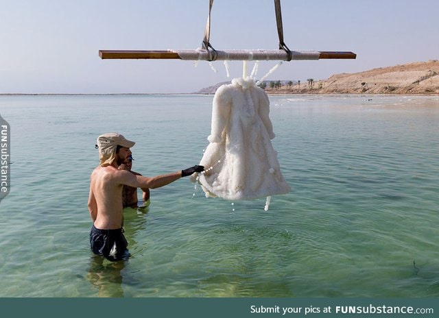 Artist leaves dress in the dead sea for 2 years and it turns into glittering salt crystal