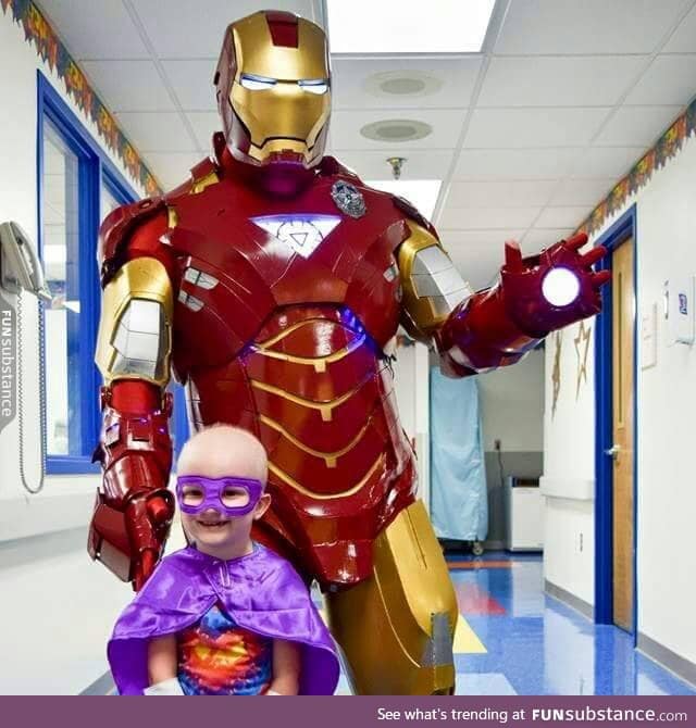 A cop dressed as Iron Man to visit a child with cancer. Absolutely heartwarming.