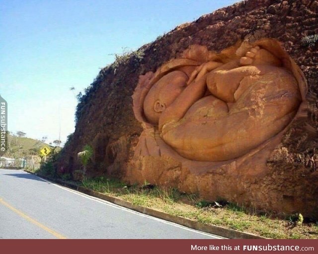 A father lost his pregnant wife to a drunk driver and carved this at the accident site