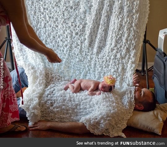 Well, That's One Way To Keep A Baby Calm For Photos