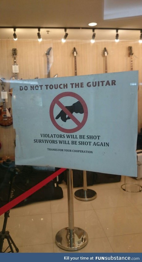 Found this sign on a guitar shop door. What you guys think?