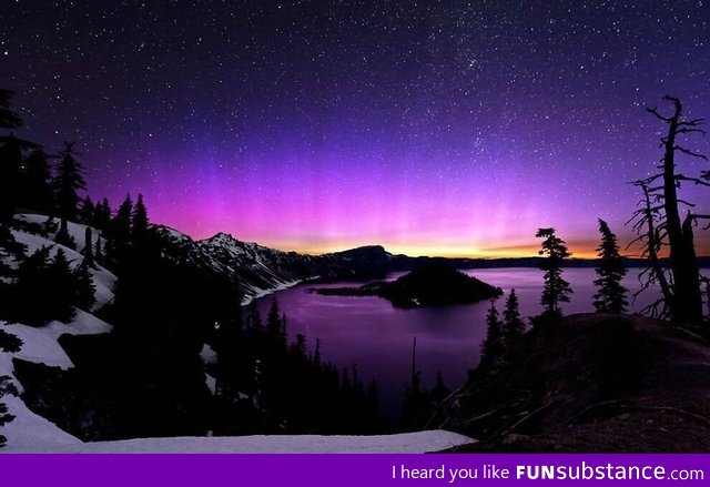 Purple Aurora over mountains. Simply Beautiful