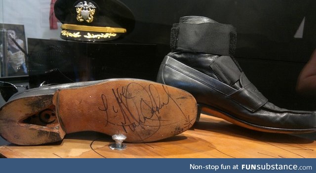 Michael Jackson's shoes next to the floor bolts that were used for him to do his lean