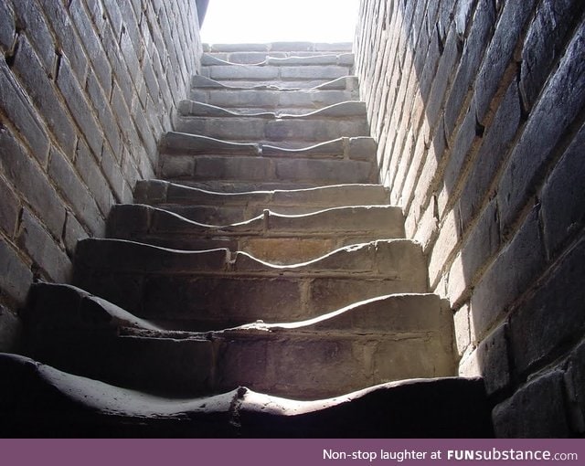 Stone stairs worn from use on The Great Wall of China