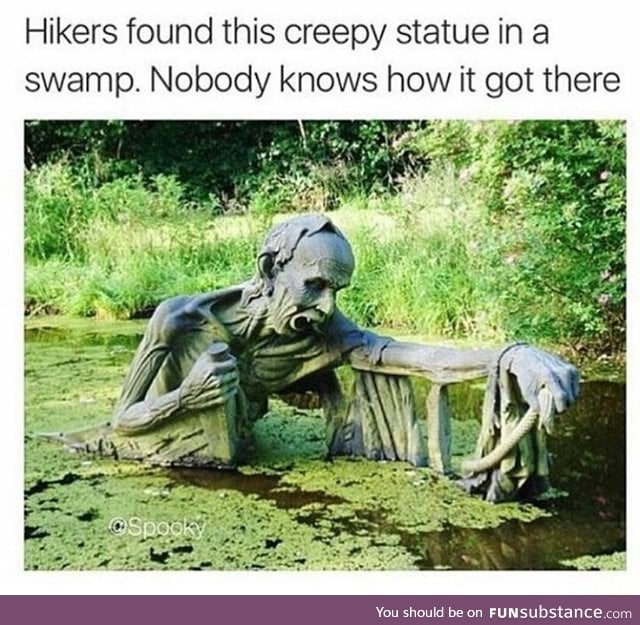 Creepy statue in a swamp