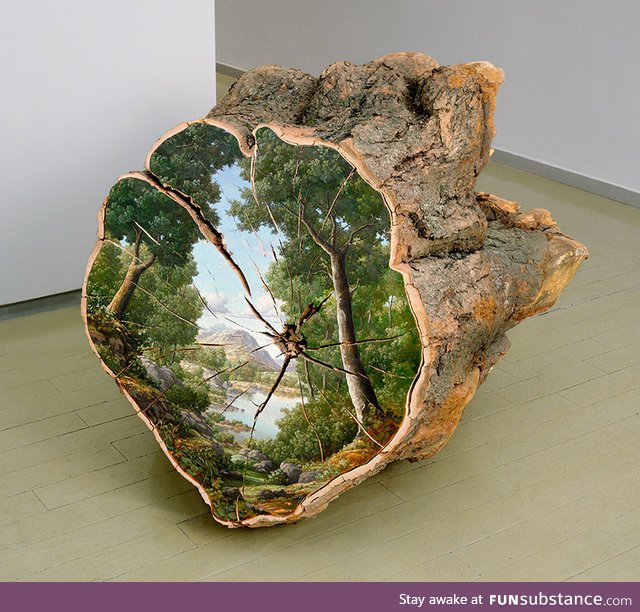 Landscape painted on fallen tree logs