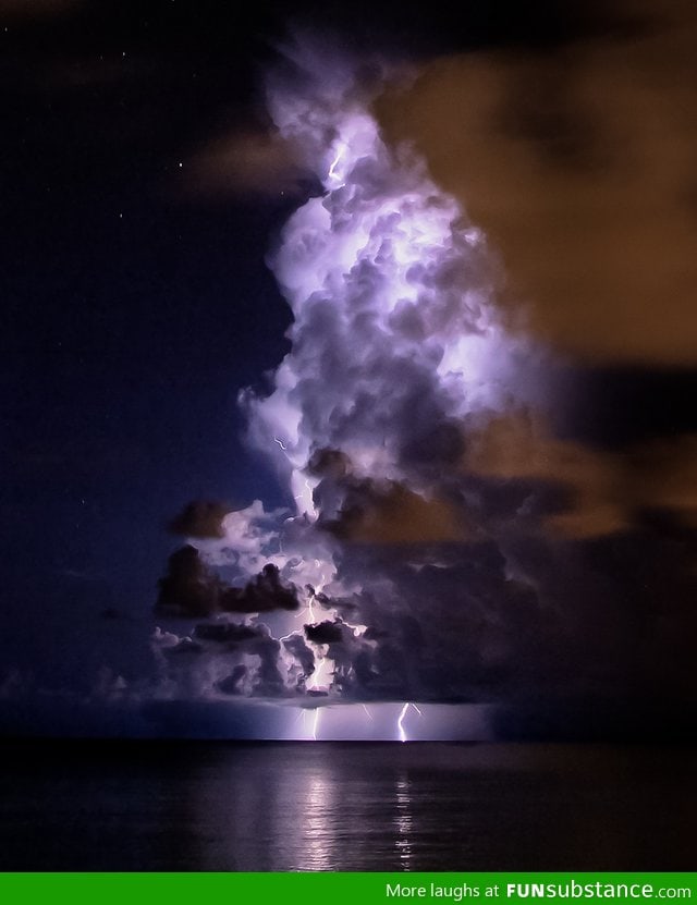 Cloud lit up by Lightning